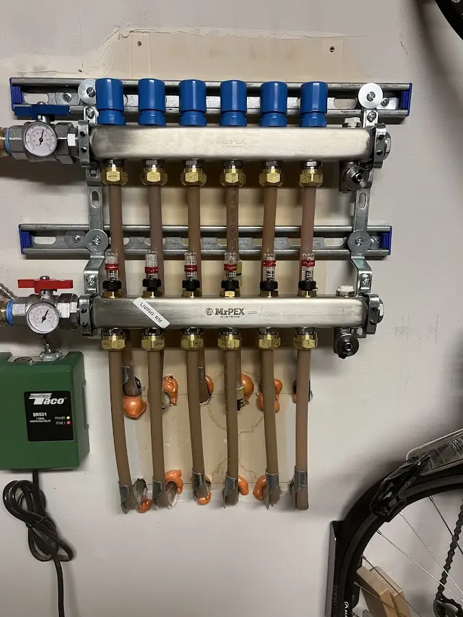 Plumber performing Water Heater Repair at a residential property in Jersey Shore